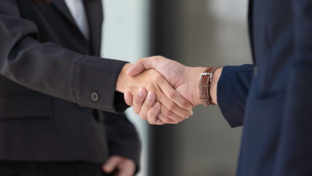 Dental Consultants Shaking Hands