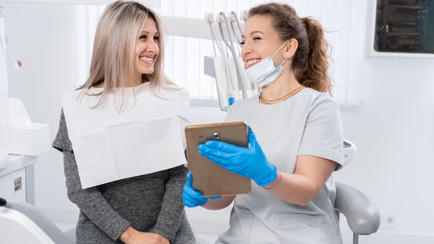 Dentist Discussing Treatment with Patient